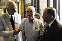 Bank President James I. Perkins with customers